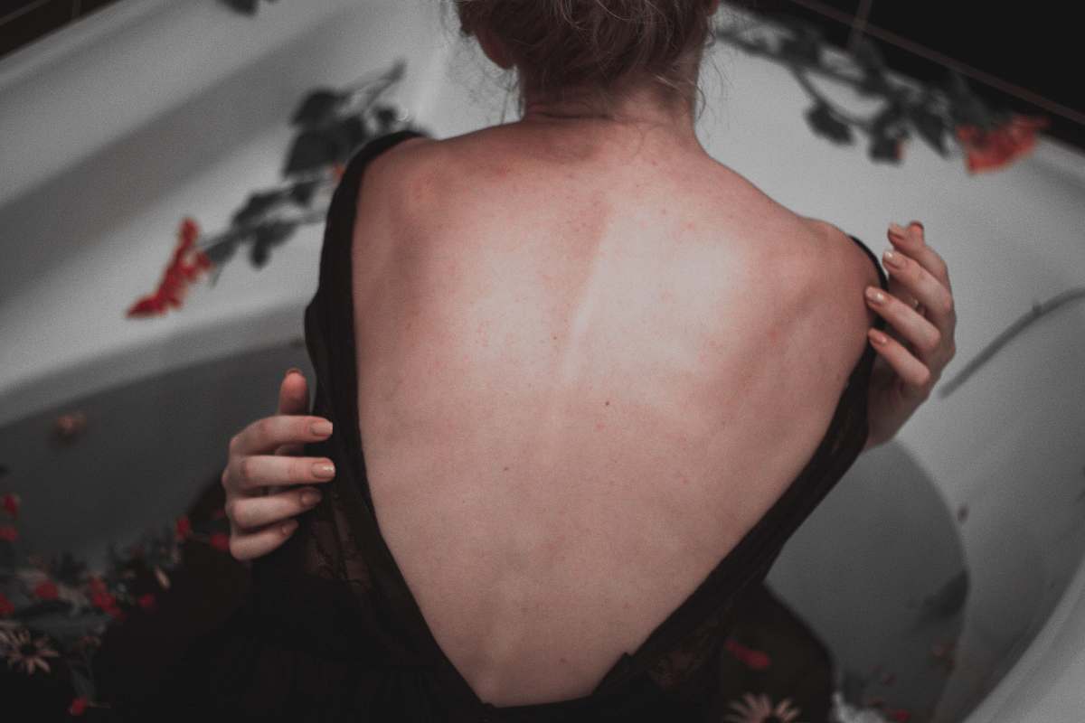 human woman showing back person