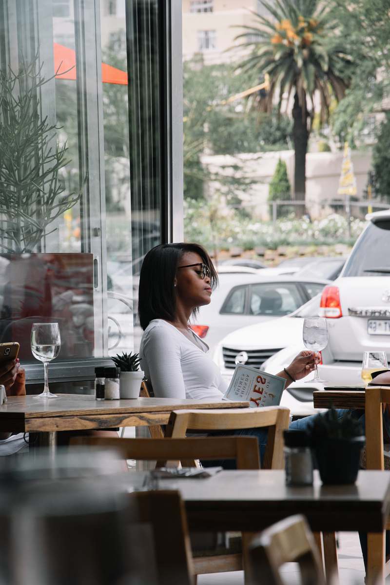 car woman sitting on brown chair table