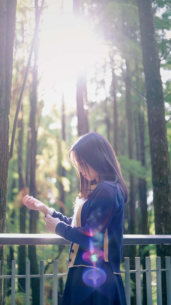 person woman standing near forest during daytime human