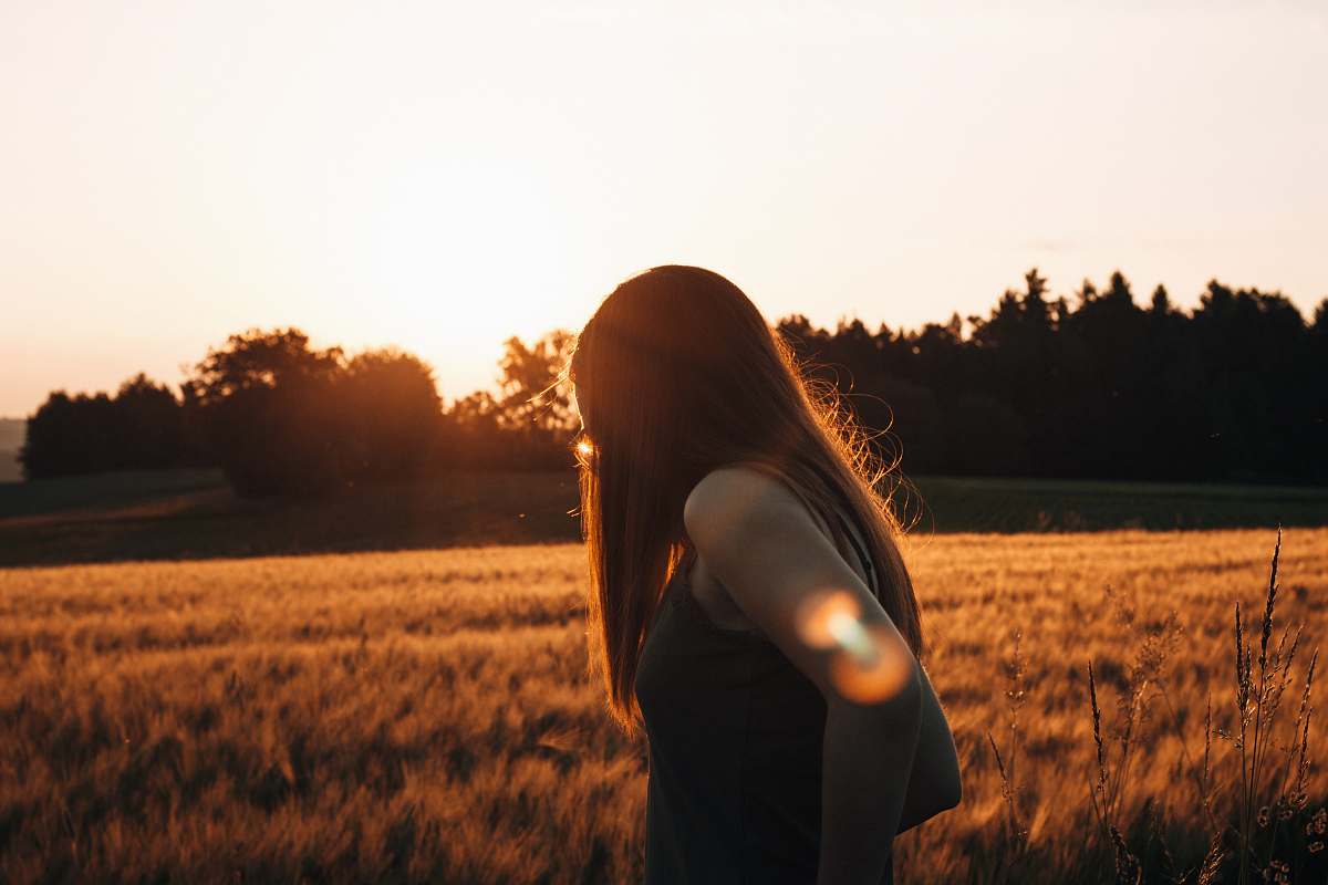 human woman standing on brown grass field person