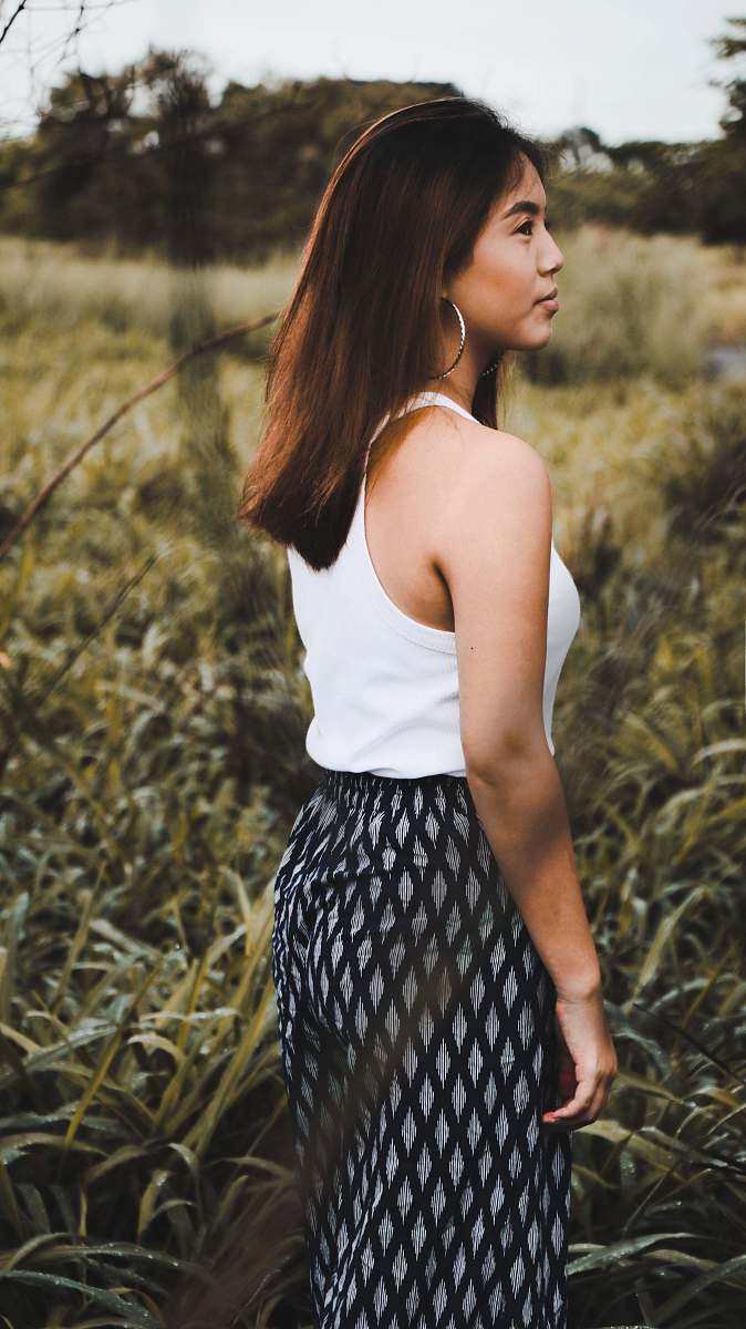 person woman standing on grassy area human