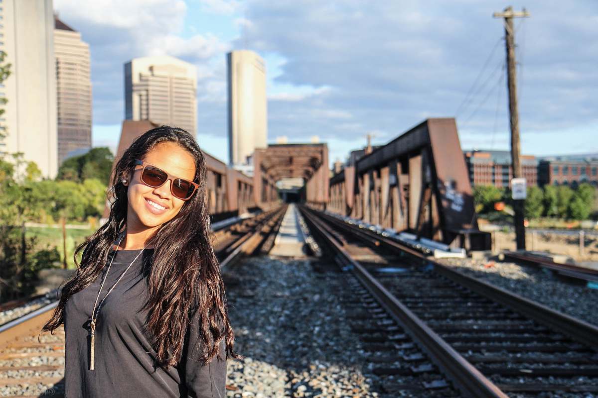 train woman standing on railings human
