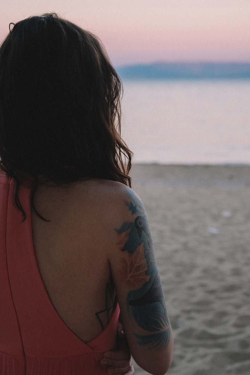 person woman standing on seashore human