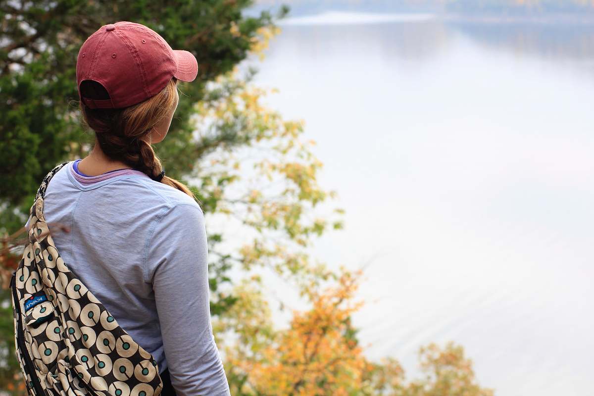 human woman wearing long-sleeved shirt person
