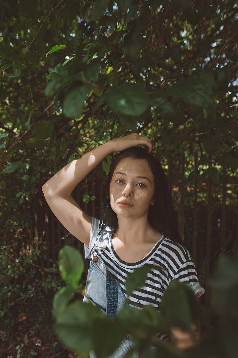human woman wearing white and black striped top person