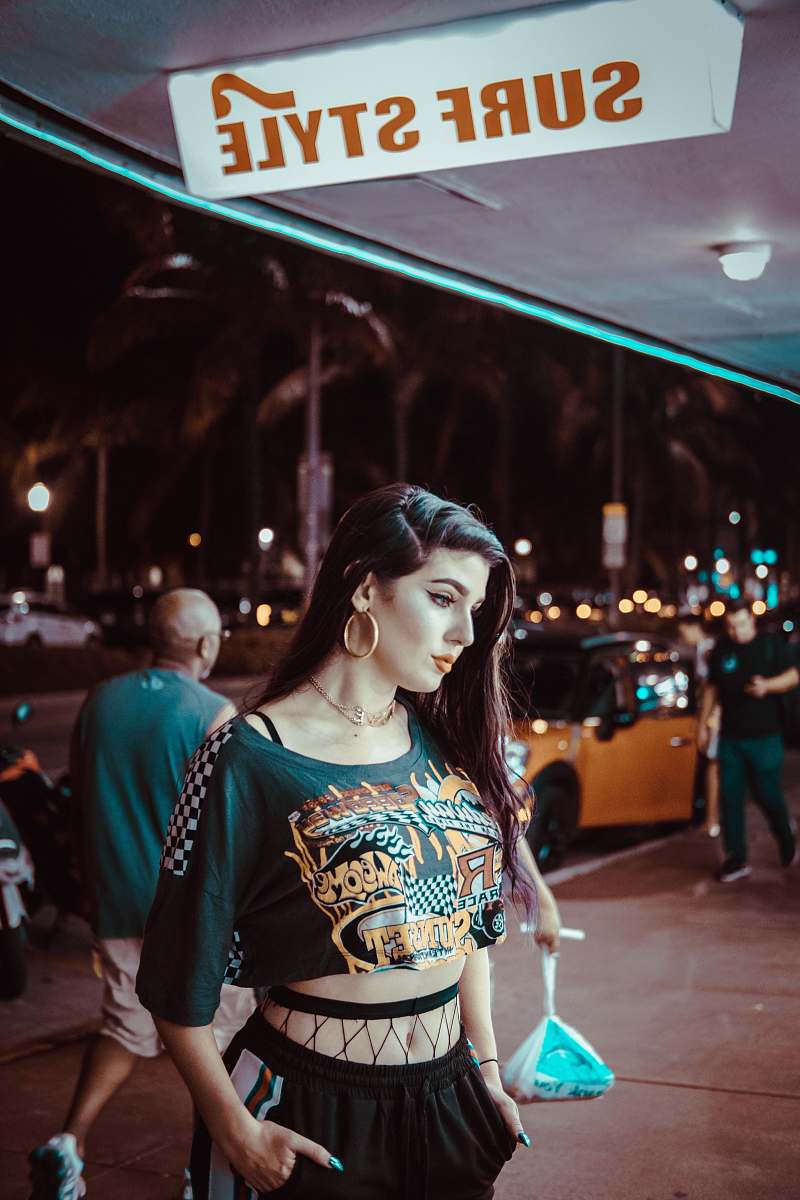 person women's green and yellow crop-top human