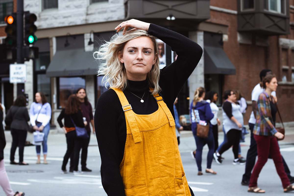 human women's yellow overall person