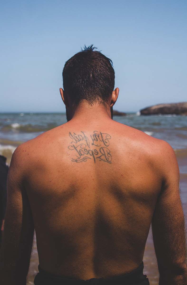 human black calligraphy tattoo people