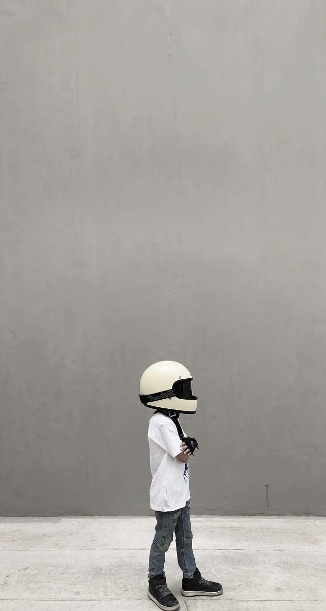 human boy wearing full-face helmet people