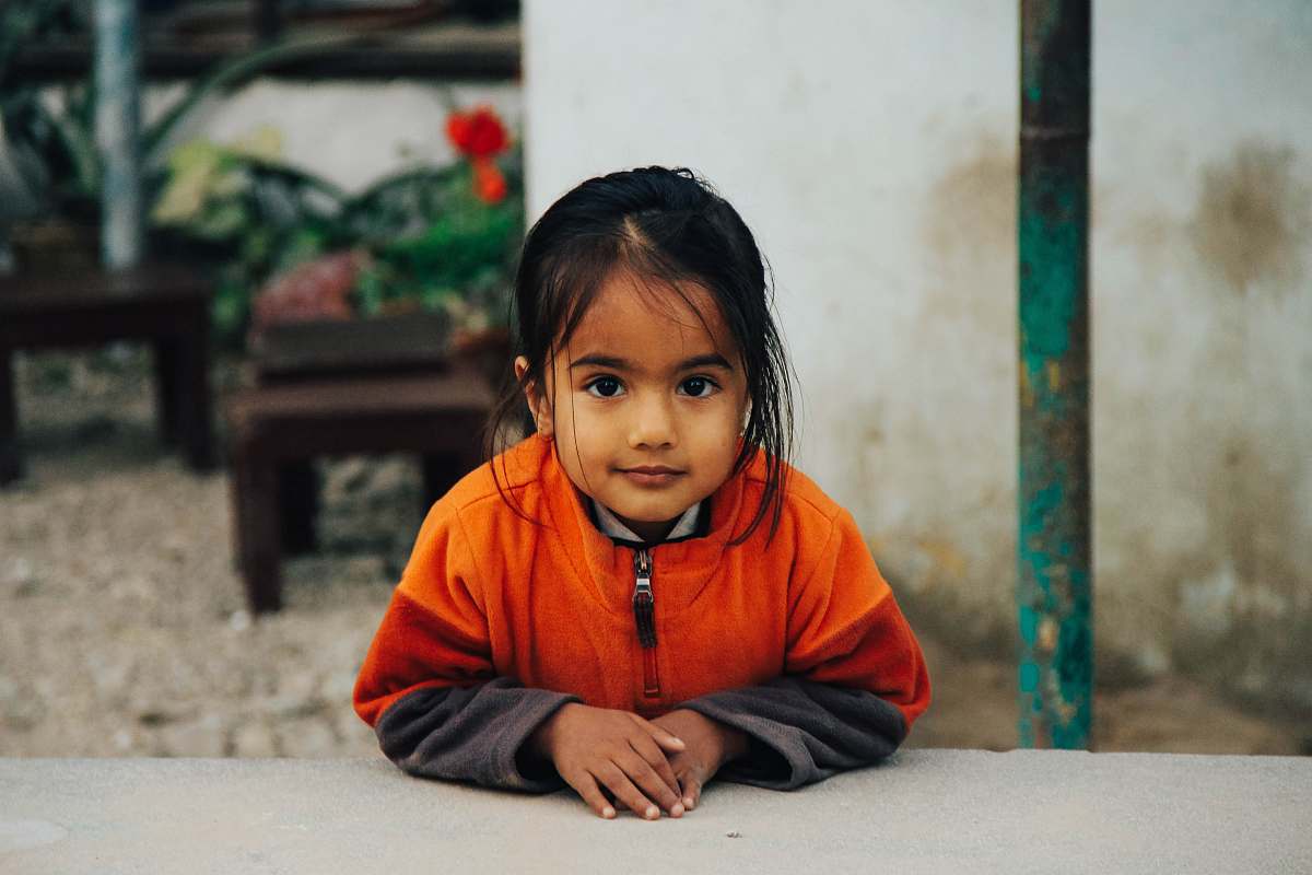 girl girl leaning over pavement female
