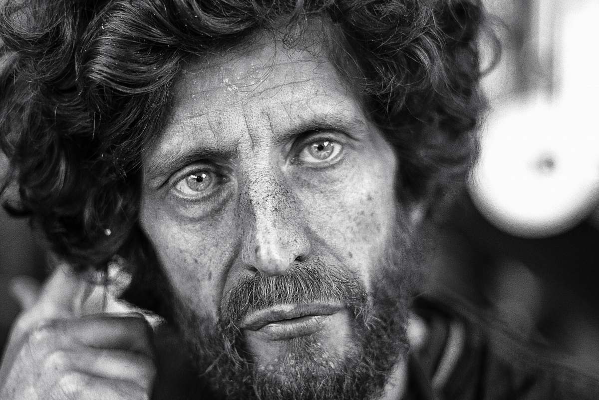 human grayscale photography of man's portrait black-and-white