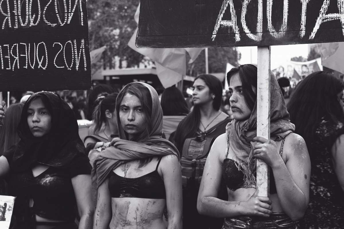 human grayscale photography of women marching people