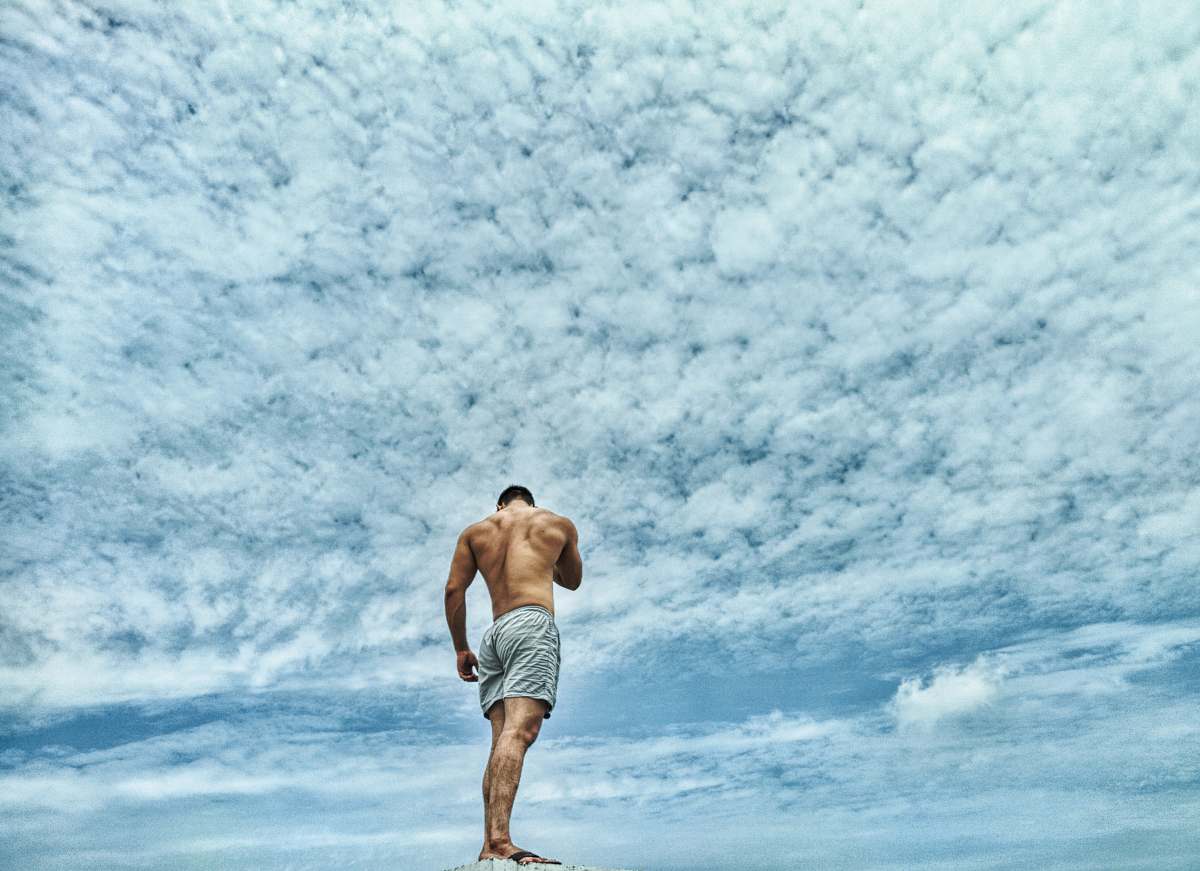human half naked man under white sky people