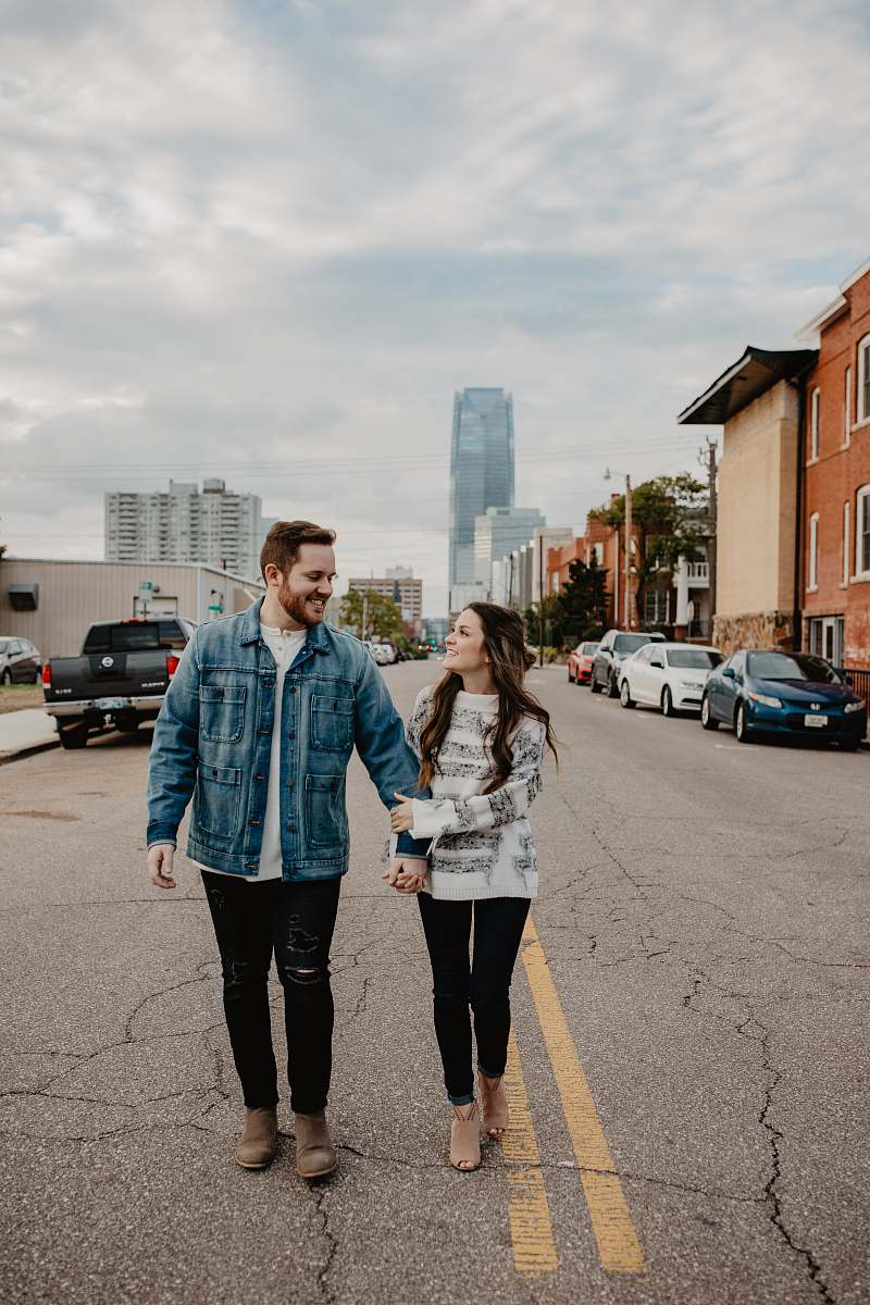 human man and woman standing on road people