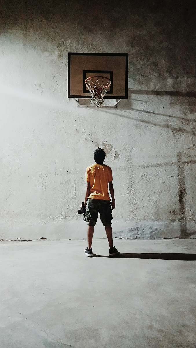 human man looking basketball ring people