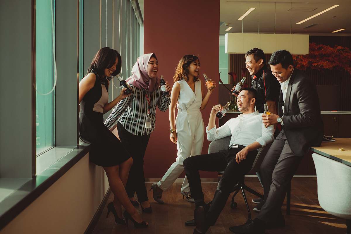 people man sitting on brown wooden table human
