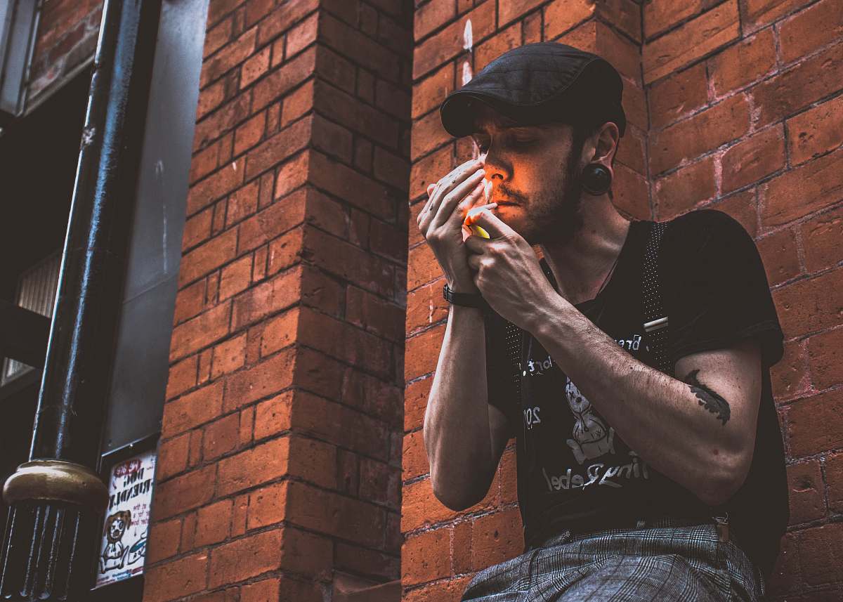 human man smoking cigarette people