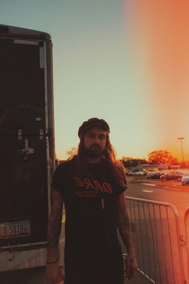 people man standing beside box van human