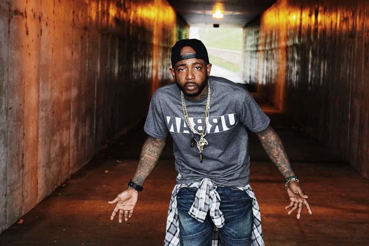 Capture the essence of urban artistry with this striking portrait of a male rapper standing boldly within a tunnel. The atmospheric setting enhances the artist's persona, making it perfect for music promotion, album covers, and artistic projects. This image showcases a blend of street culture and creativity, ideal for those seeking to convey a sense of authenticity and style in their visual content.