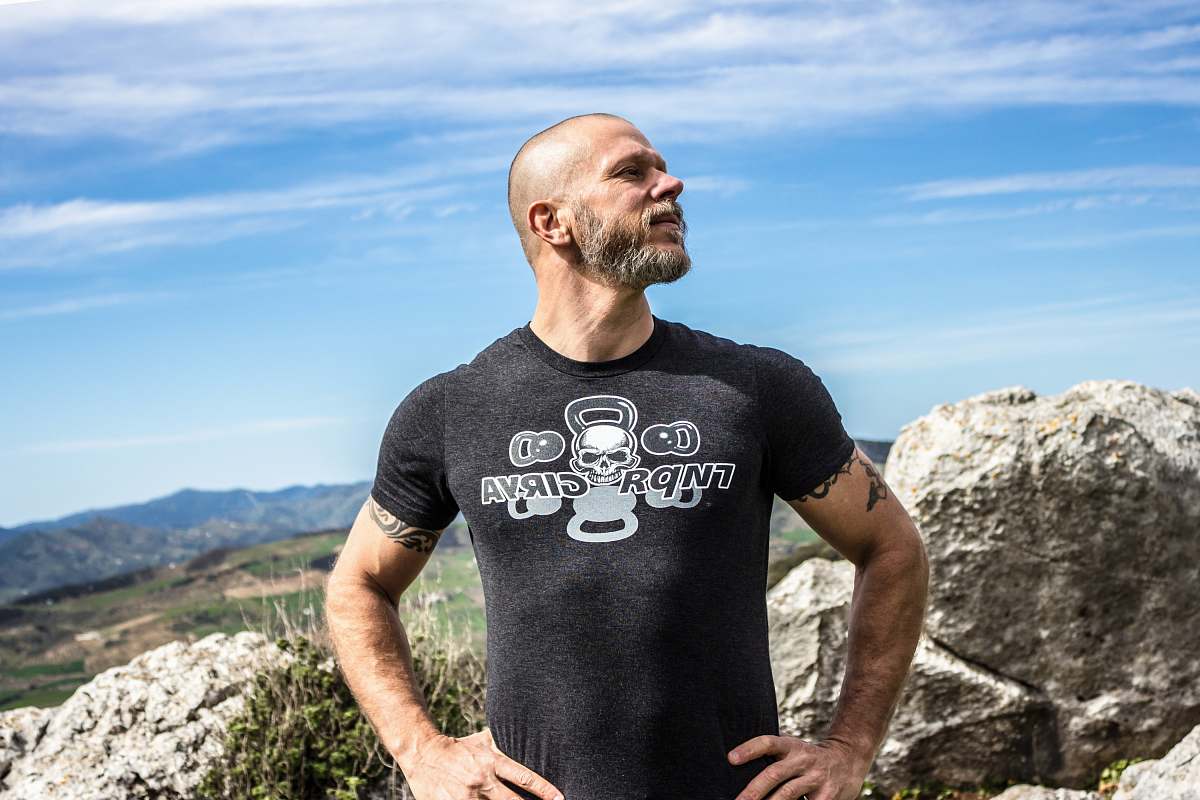 people man standing near rock formation human