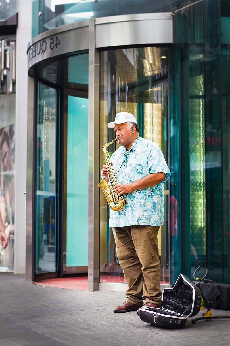 people man standing playing saxophone human