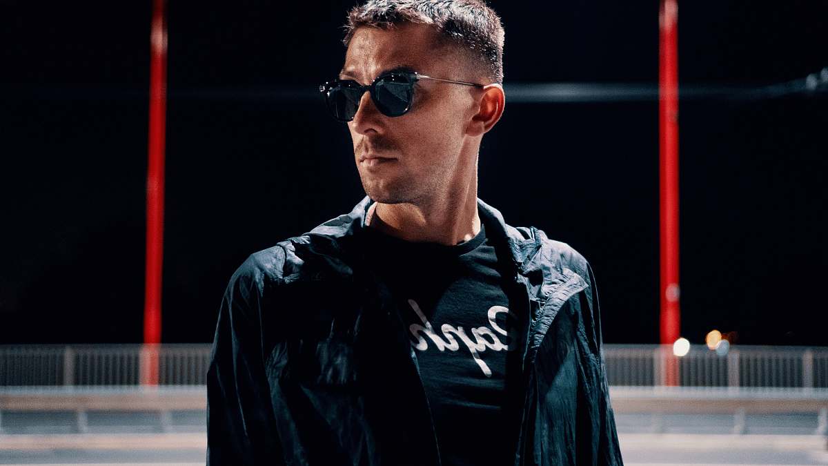 people man wearing black jacket and sunglasses close-up photo human