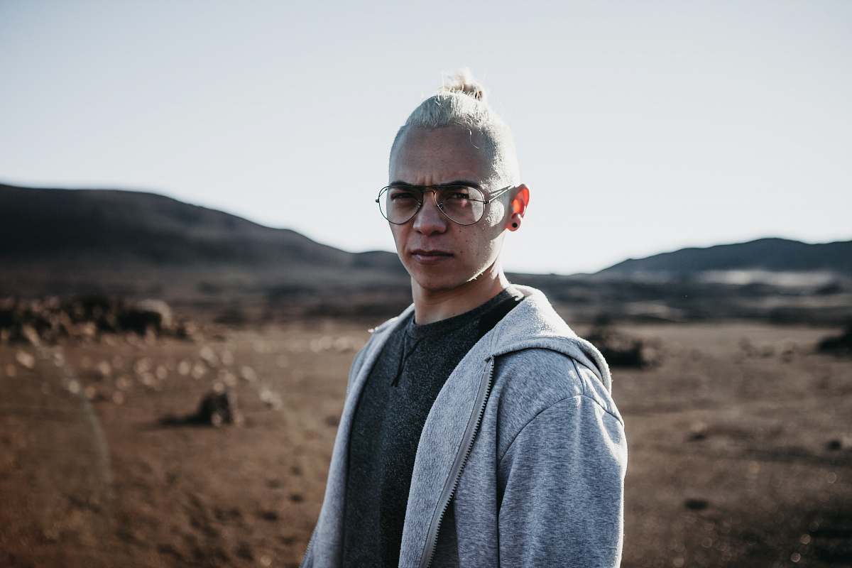 human man wearing gray mask people