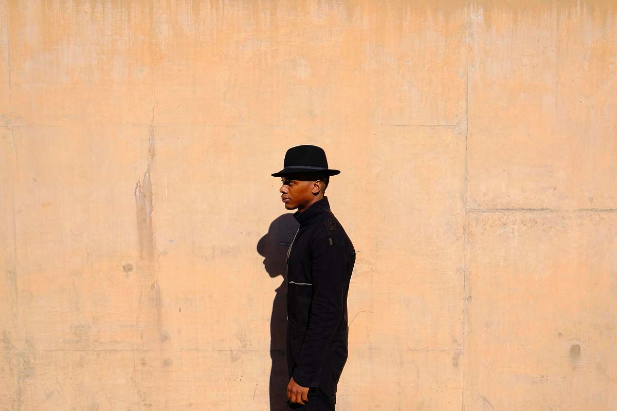 people minimalist photography of man facing to the side human