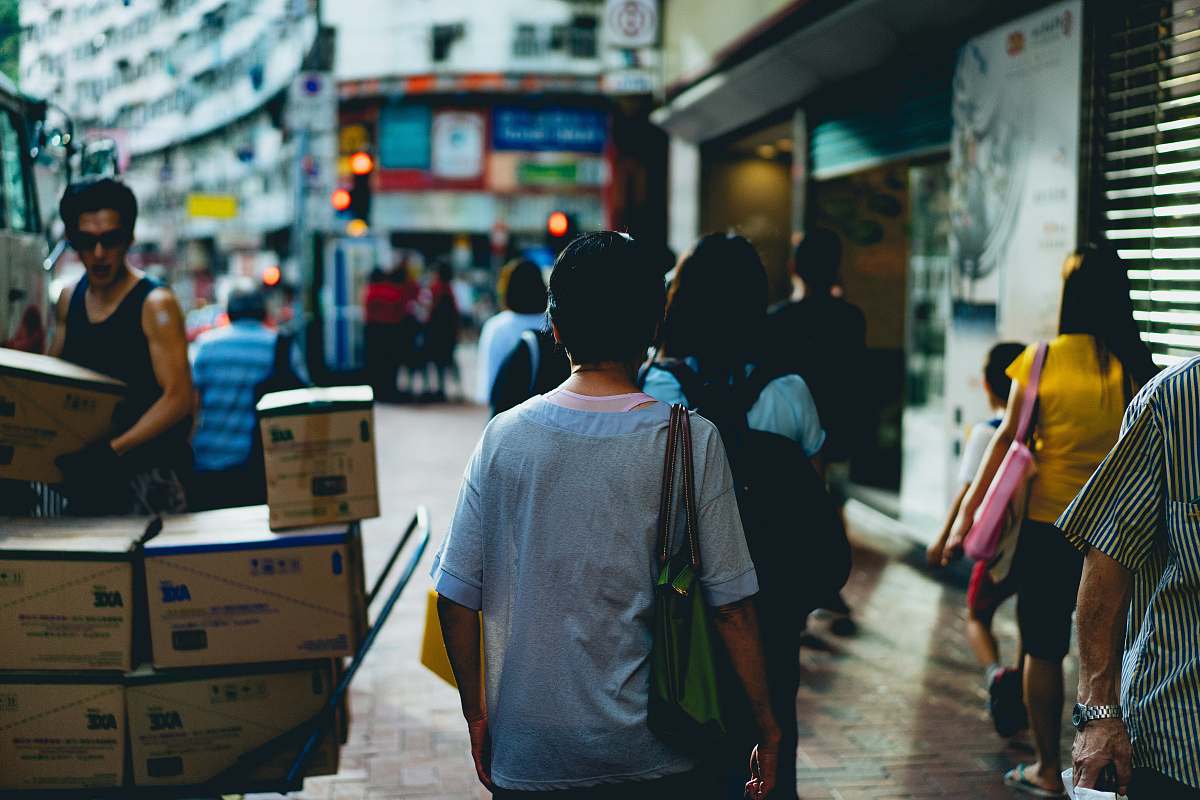 people people walking on street during daytime human