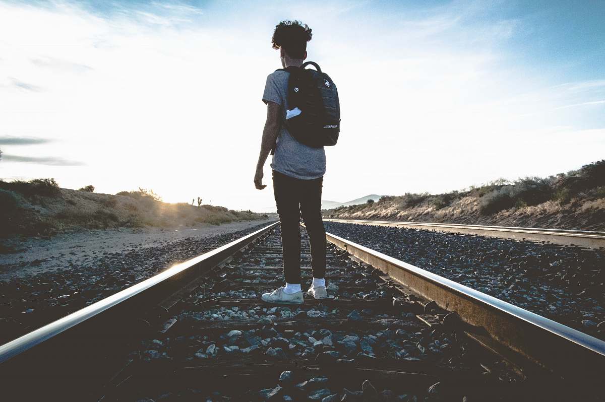 human person standing in train rail people