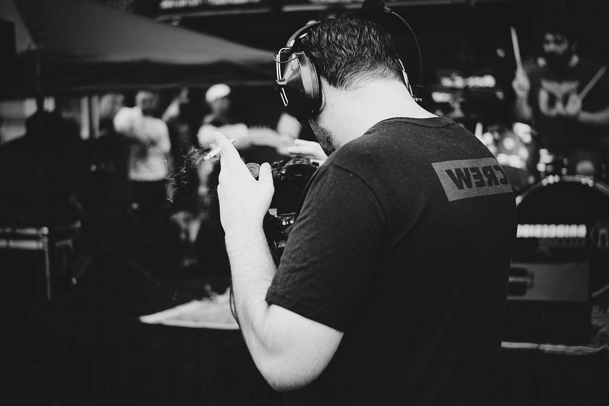 human person using headphones black-and-white