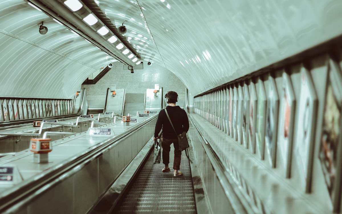 people person walking on escalator human