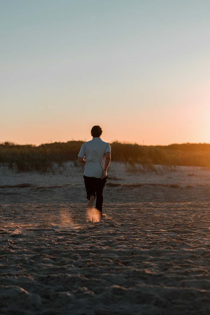 human person walking on the sand people