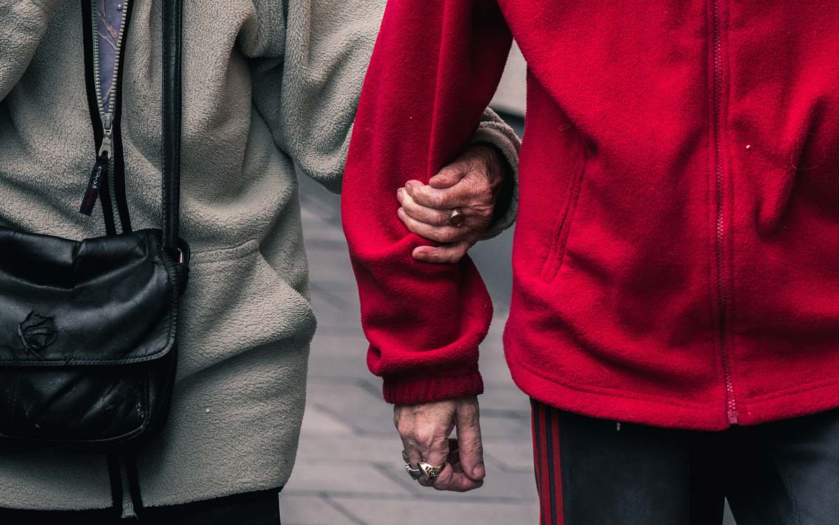 people person wearing red jacket human