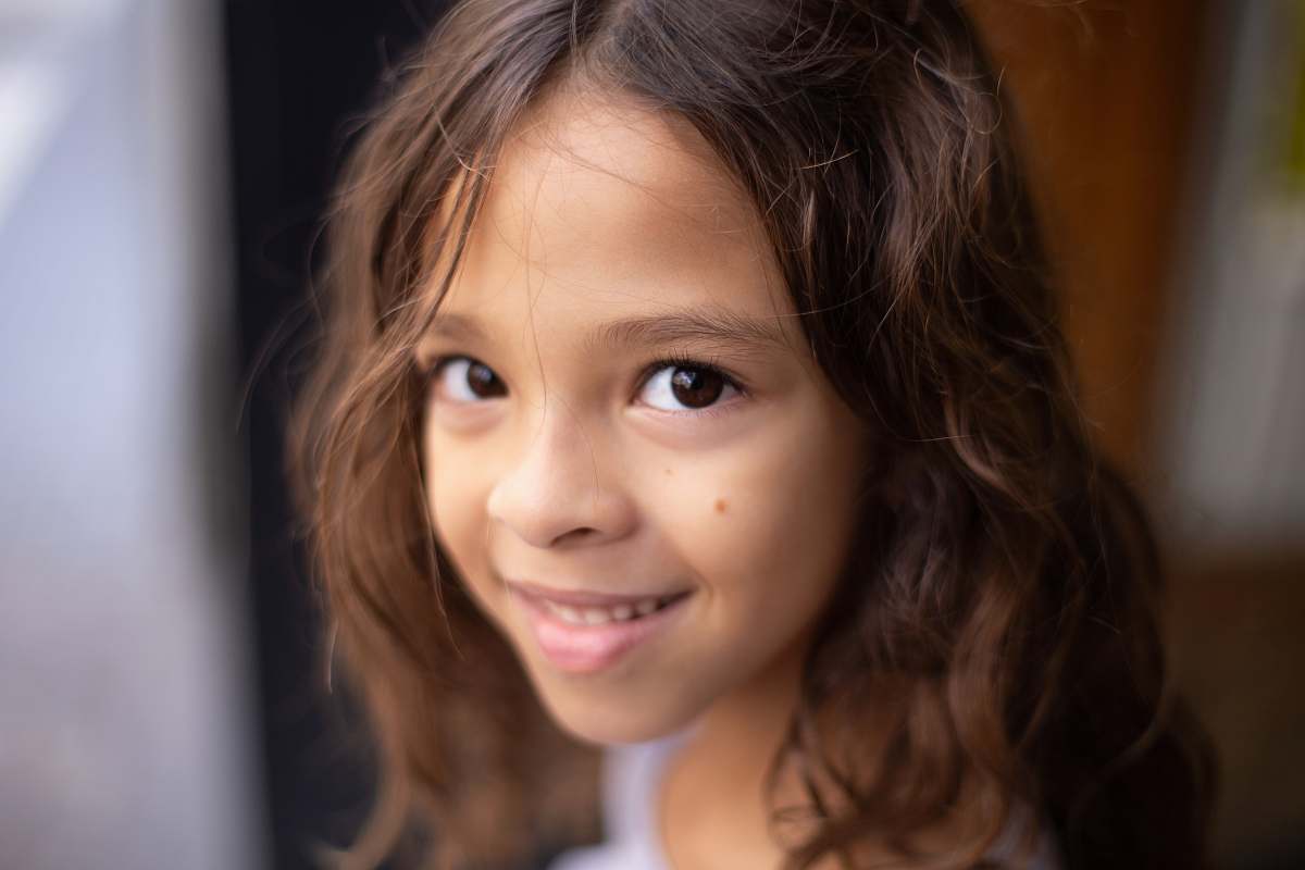 human selective focus photo of smiling girl people