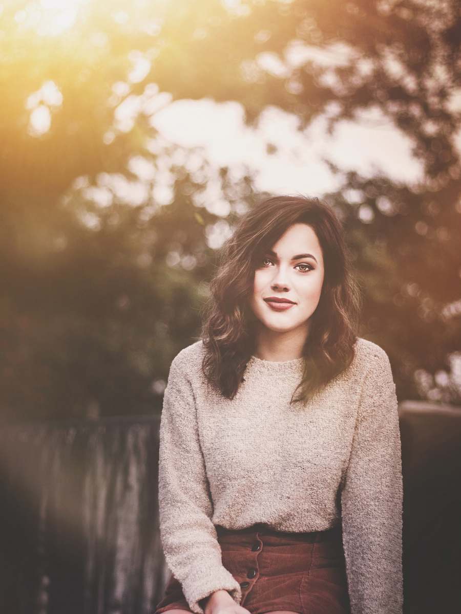 human selective focus photography of gray crew-neck sweatshirt people