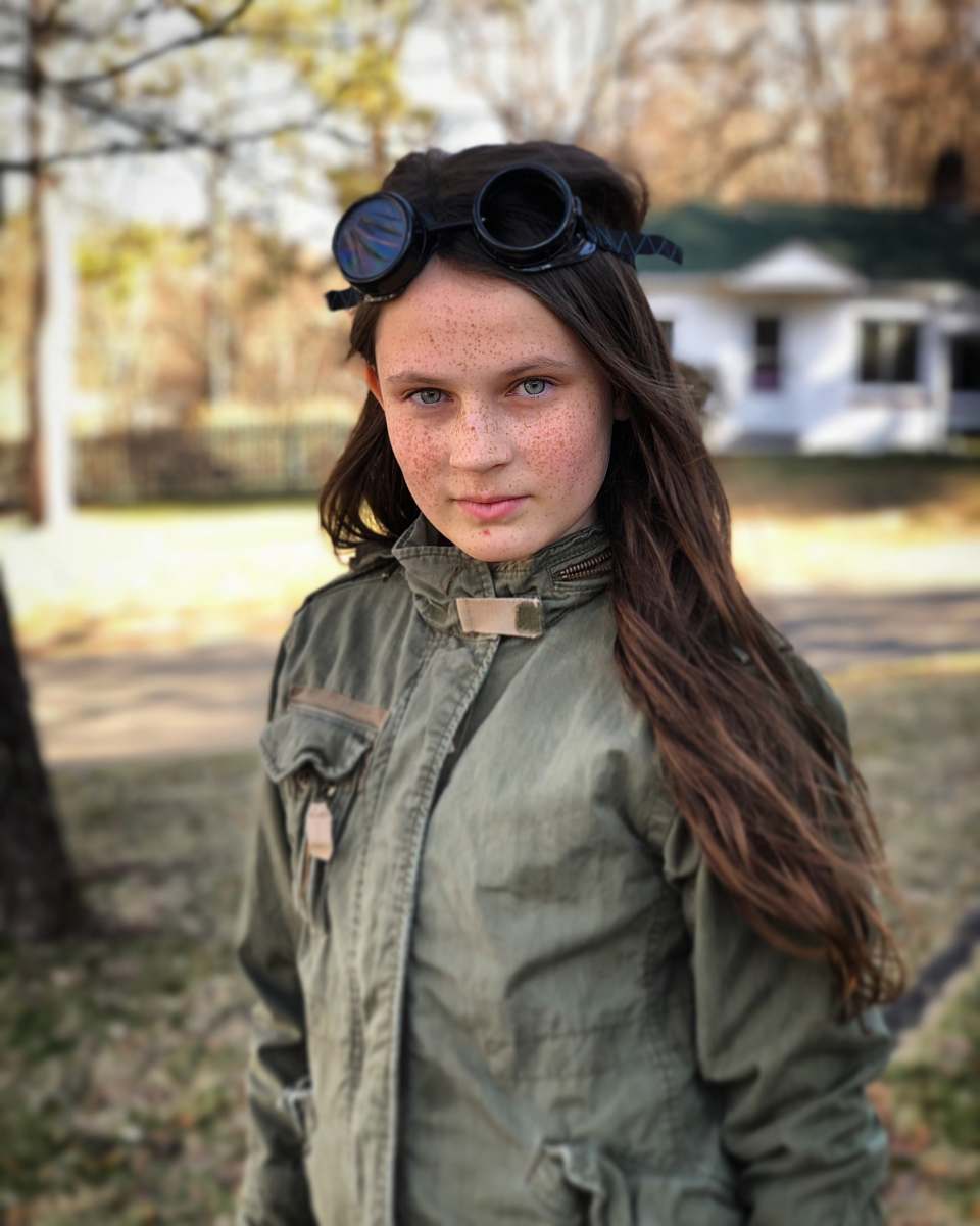human selective focus photography of woman in green jacket people
