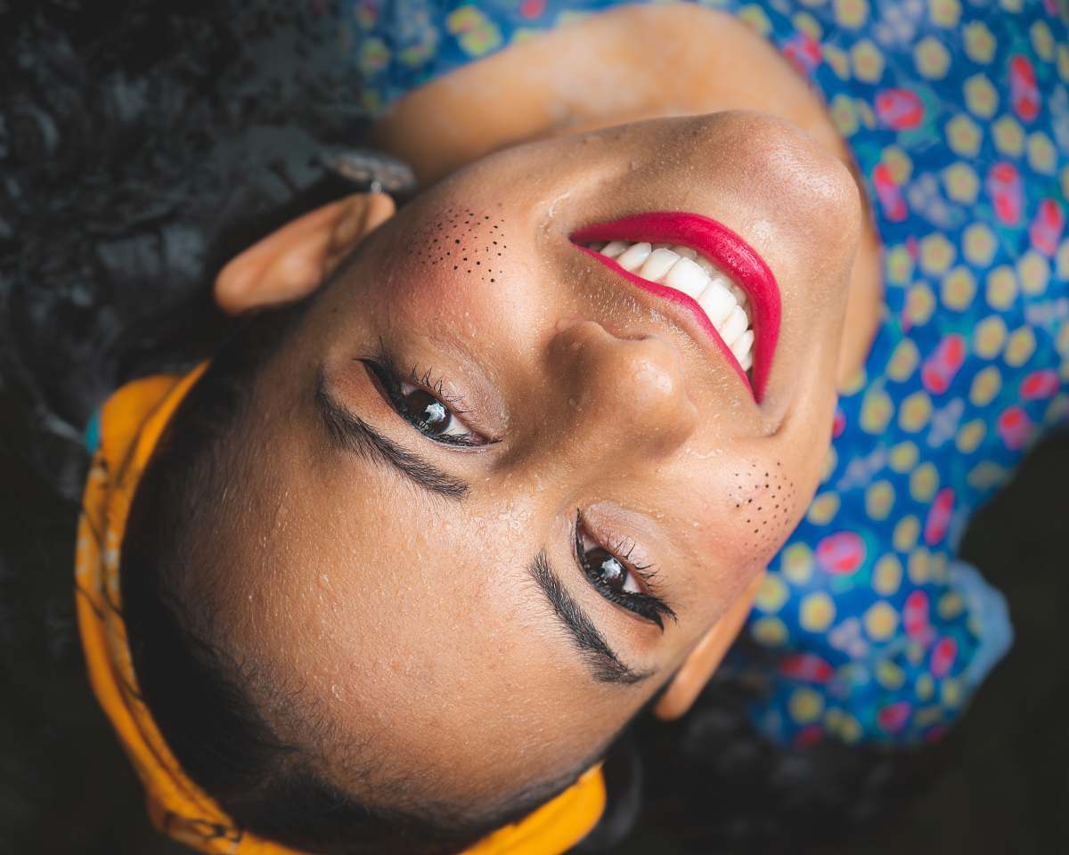 people shallow focus photo of woman smilling human