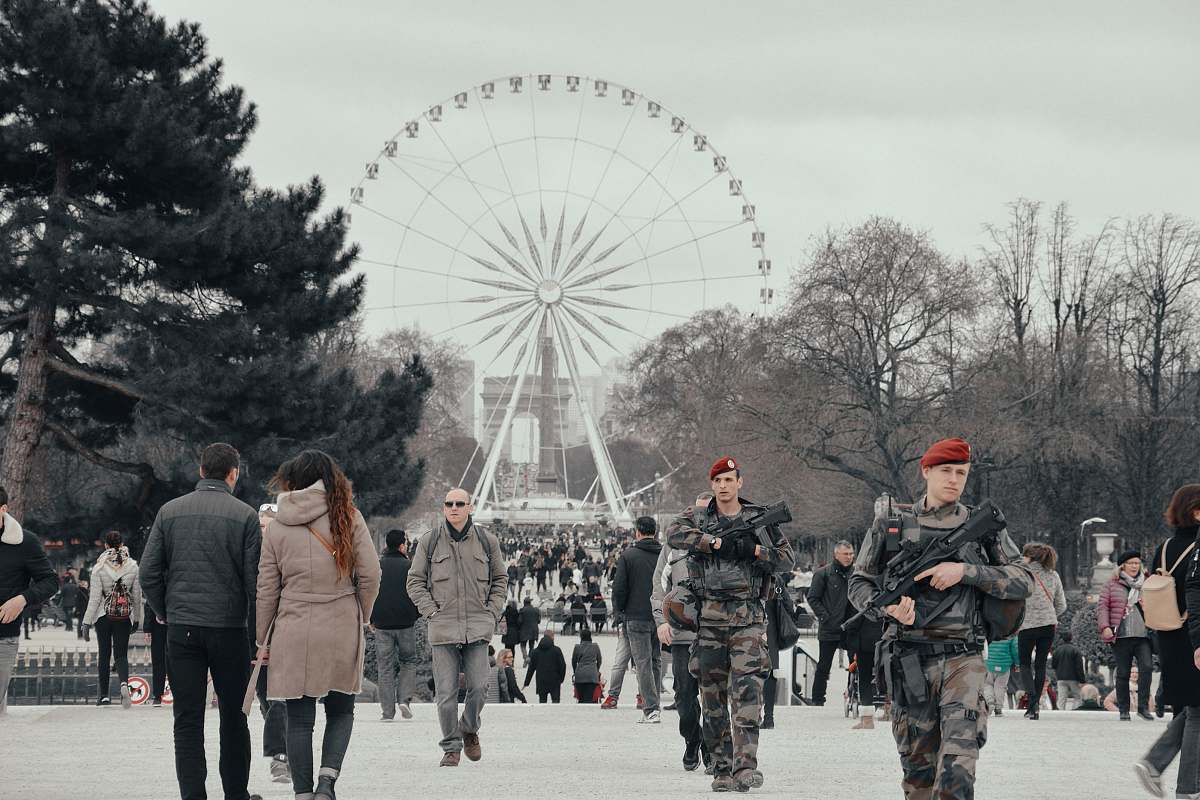people white ferris wheel near trees human