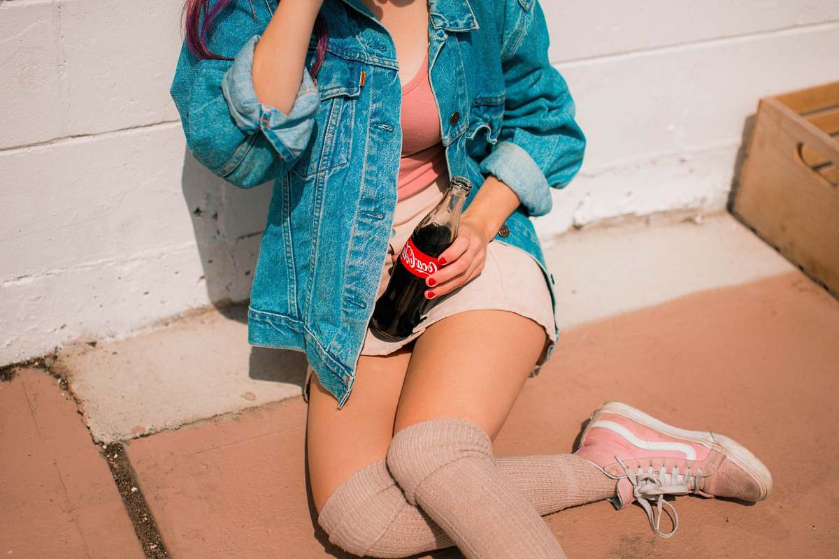 people woman holding Coca-Cola bottle human