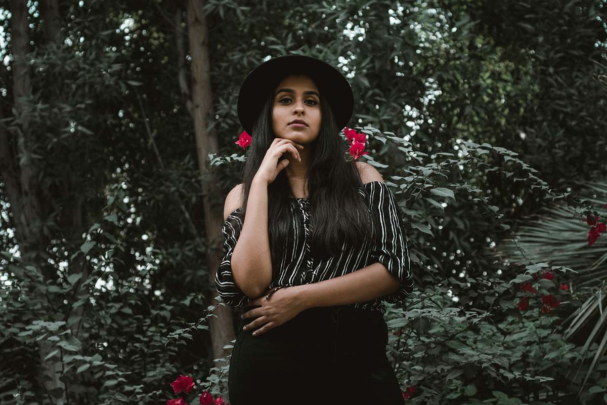 human woman in black and white striped off-shoulder shirt people
