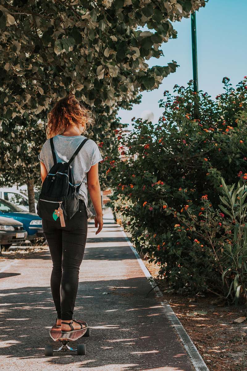 human woman in black jeans and white t-shirt people