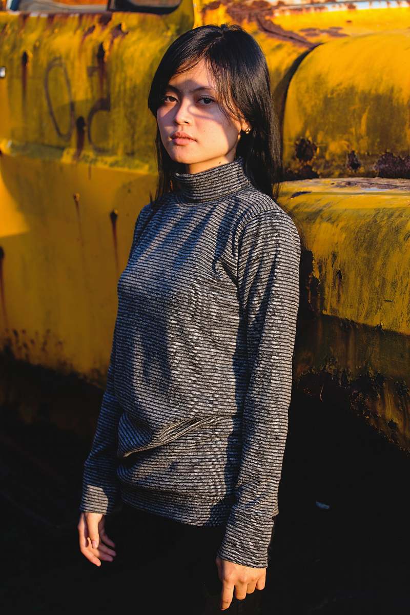 human woman in black long-sleeved tee shirt people