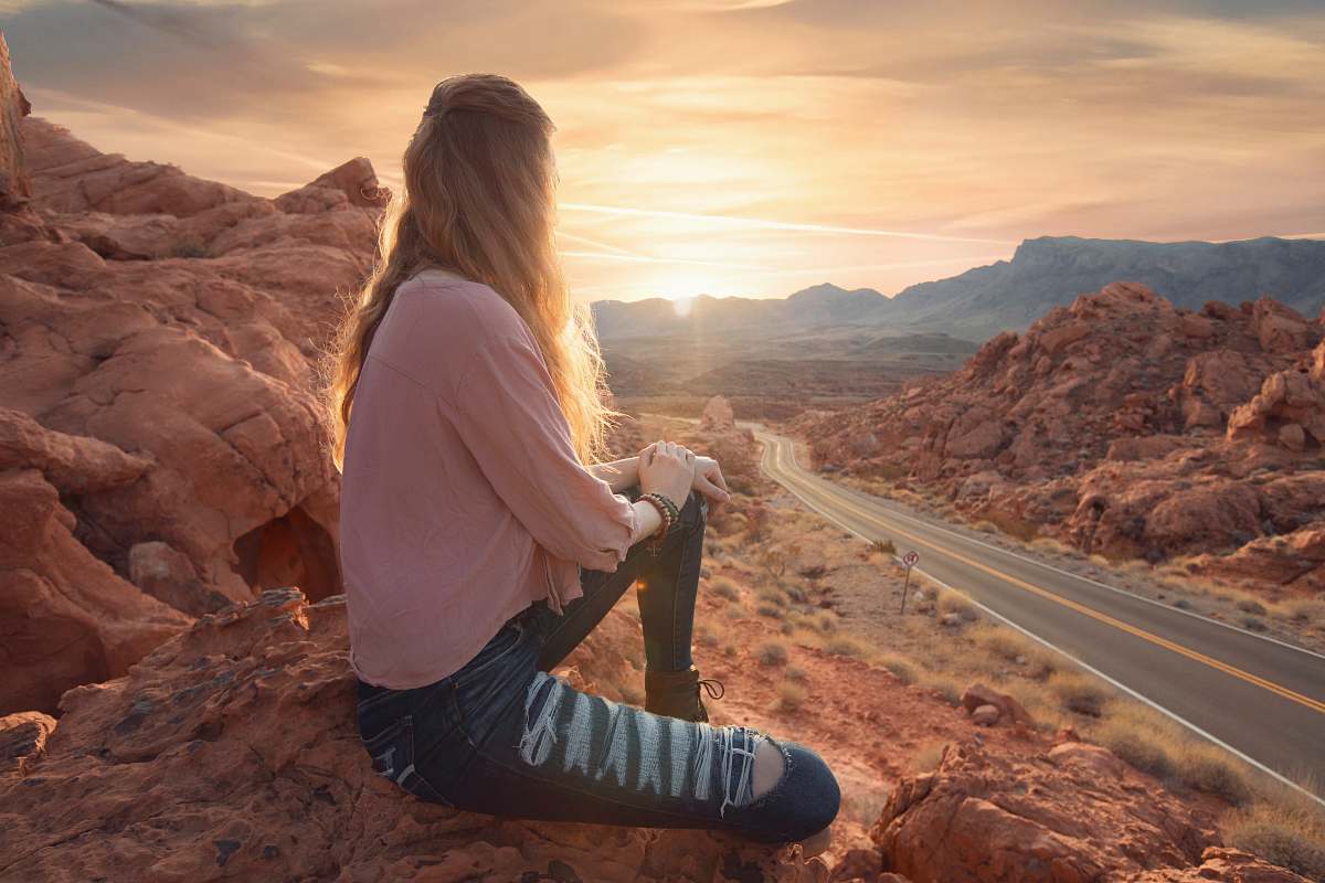 people woman in pink long-sleeved shirt and blue denim pants human