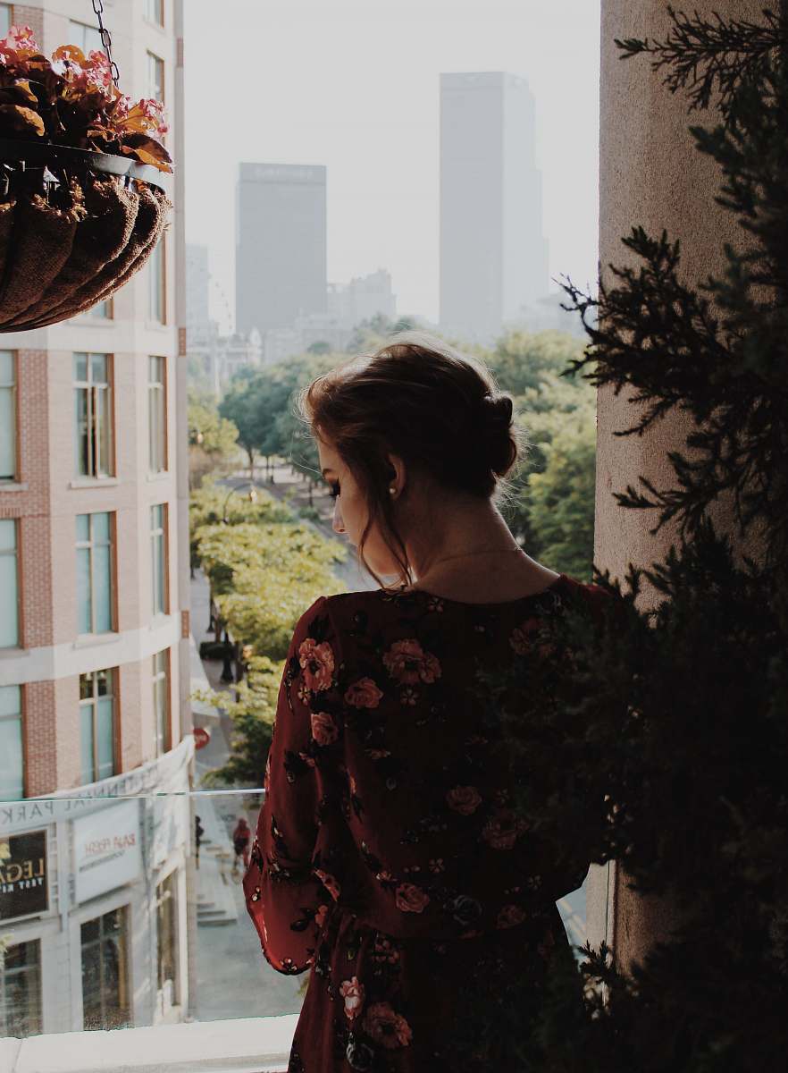 human woman leaning on wall people
