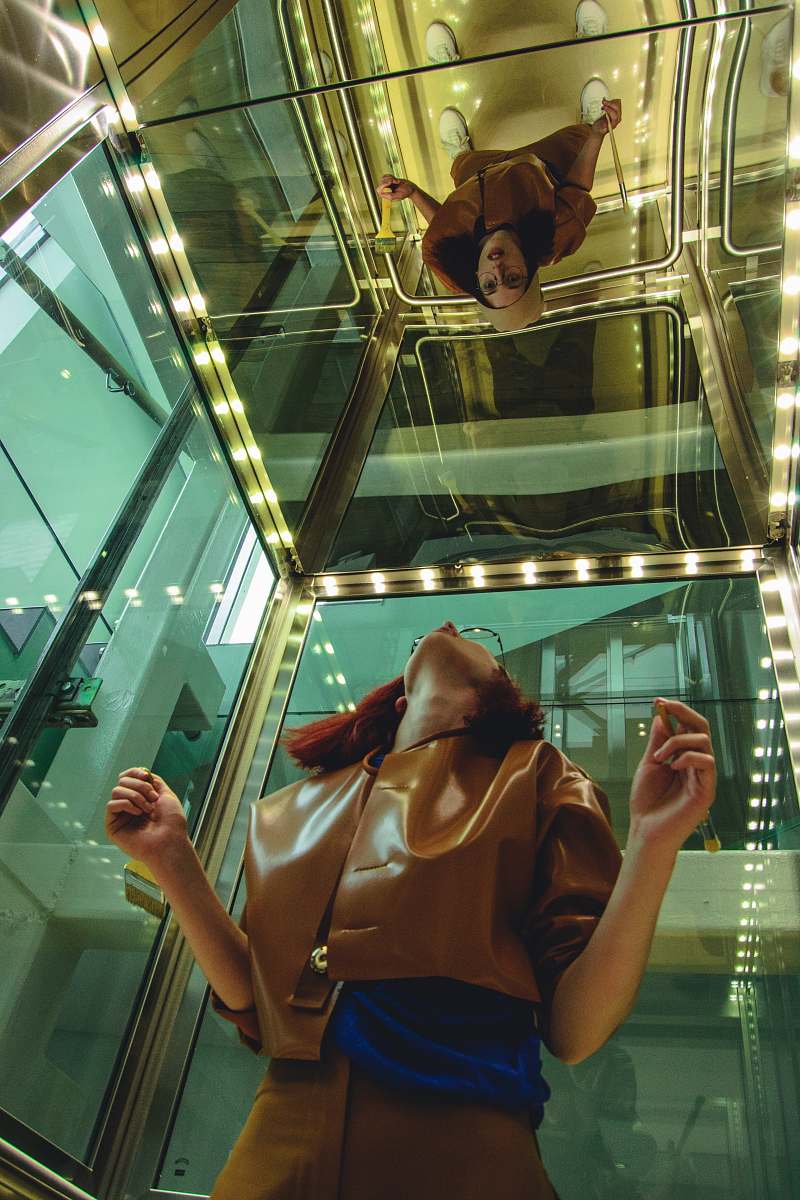 people woman looking at mirror human
