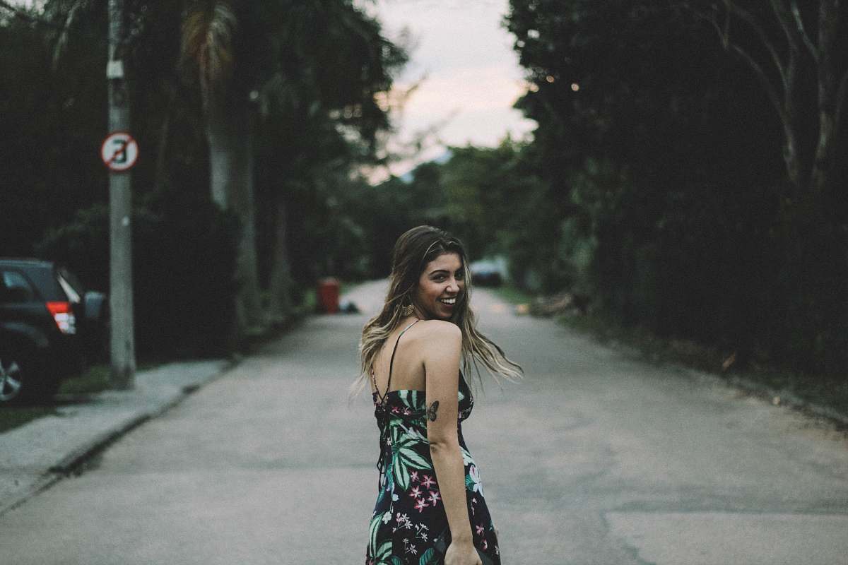 human woman looking over shoulder people