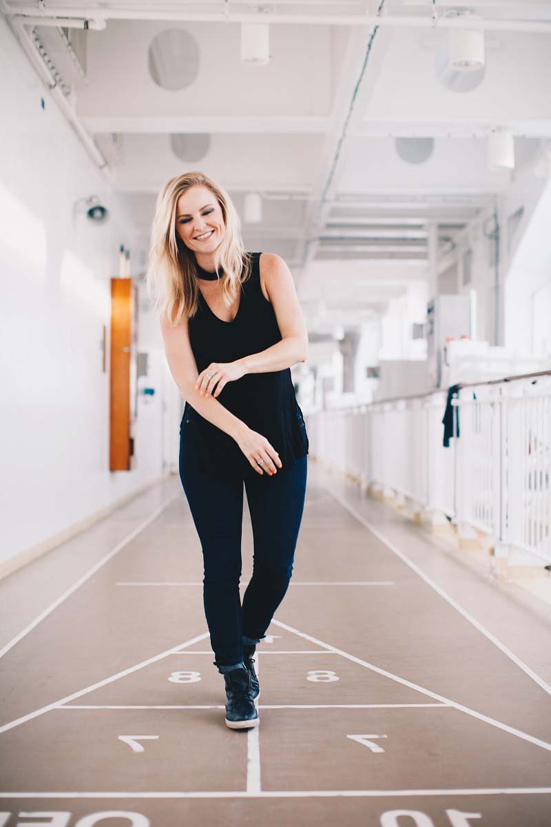 human woman playing floor game on corridor people