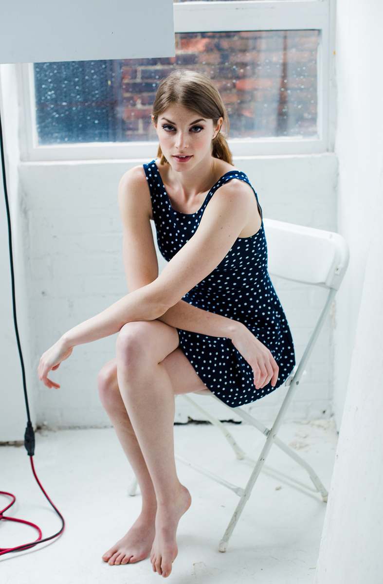 human woman sitting on white folding chair people