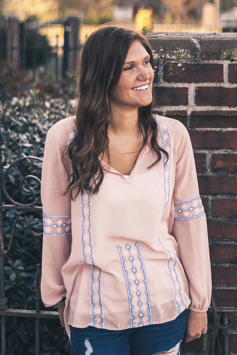 human woman smiling looking left direction people